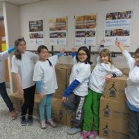 William Dunbar School students point out the benefit of book drives: to engage both donors and recipients in literacy. image